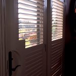 Frenchdoorswithdividerrailstocontrollightandprivacy Shutter ColumbiaBlindsandShutters
