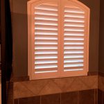 LouveredArchShutterovermasterbathinOldHawthorn ColumbiaBlindsandShutters