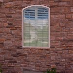 ShallowarchedNormandyshutters() ColumbiaBlindsandShutters