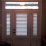 SidelightsandEntrydoorcoveredwithshutters() ColumbiaBlindsandShutters