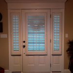 SidelightsandEntrydoorcoveredwithshutters() ColumbiaBlindsandShutters