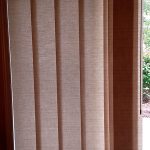 SkylinefabricglidingpanelsfromHunterDouglasVertical ColumbiaBlindsandShutters