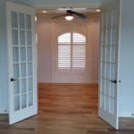 Beautiful arched shutters installed at Old Howthorne in Columbia by Columbia Blinds and Shutters