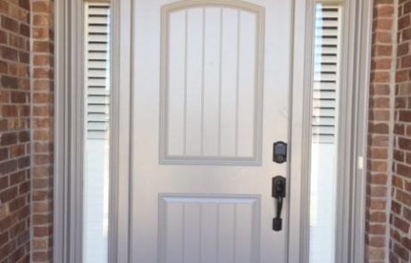 Norman Shutters on Door Sidelights Windows for Front Doors by Columbia Blinds and Shutters in Missouri